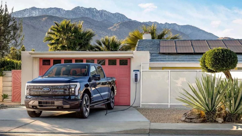 Ford F-150 Lightning EV pickup truck charging at home