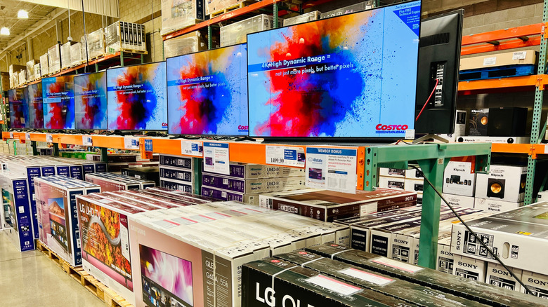 Large HDR and OLED televisions for sale inside Costco warehouse