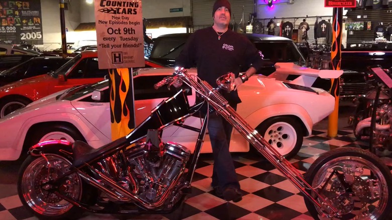 Danny Koker posing with chopper