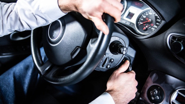 A driver switches on the ignition