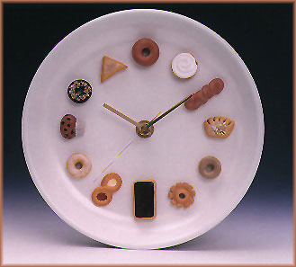 clock decorated with donuts
