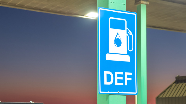 A sign indicating DEF is available at a truck stop