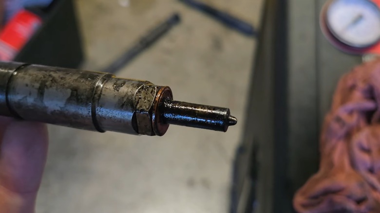An injector with evidence of wet stacking