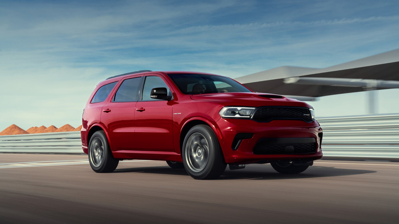 Red 2026 Dodge Durango on city highway