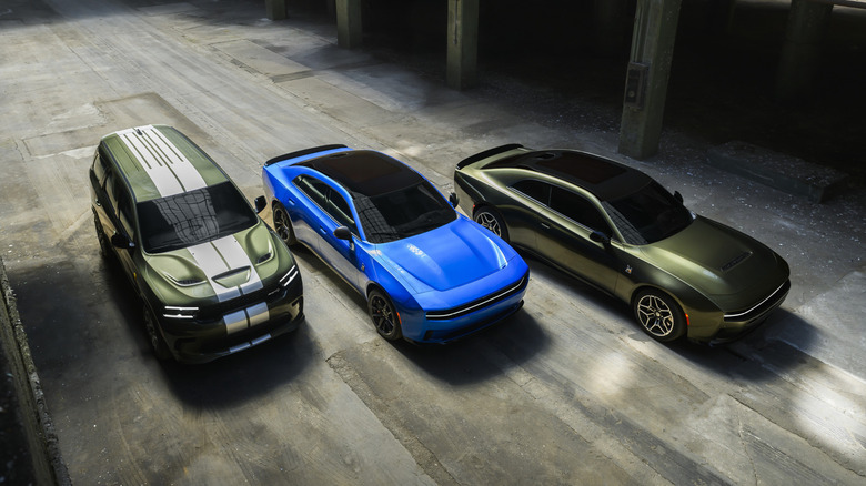 Dodge Durango, Dodge Charger Daytona, and Dodge Charger SixPack parked in garage