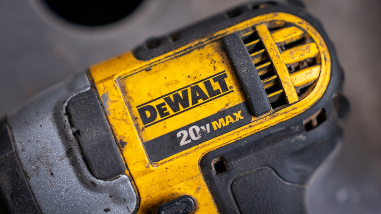 Close-up of DeWalt logo on the side of a tool.