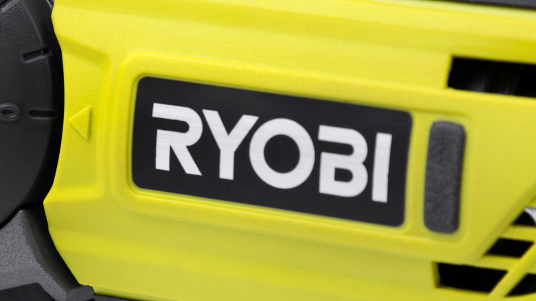 Close-up of the Ryobi logo on a tool