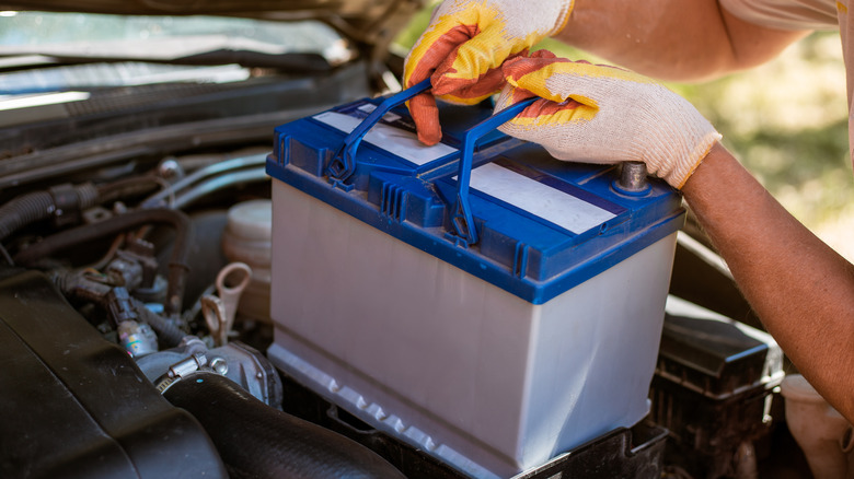 car battery being installed