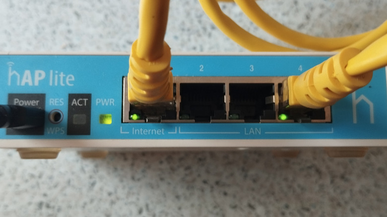 Close up of router running a successful loopback test using a single Ethernet cable.
