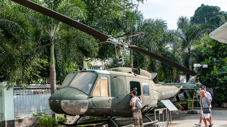 A Huey helicopter on display at an exhibition