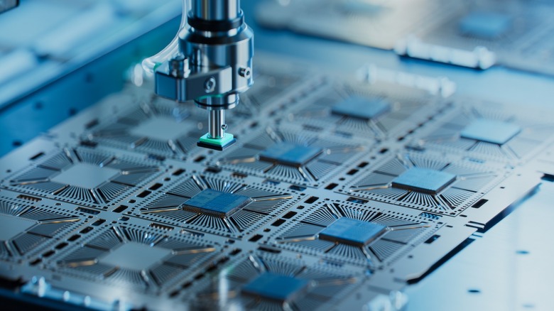 Chip manufacturing process showing silicon extracted from semiconductor wafer