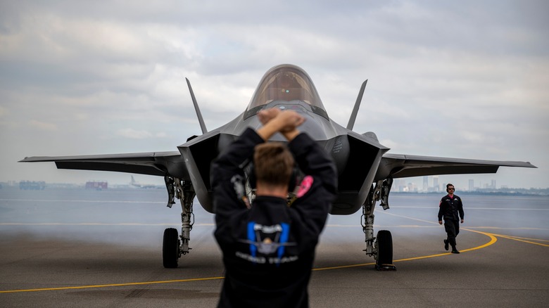 An F-35 readies itself for takeoff on the runway.