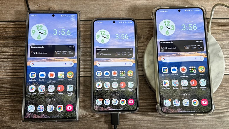 Three phones charging