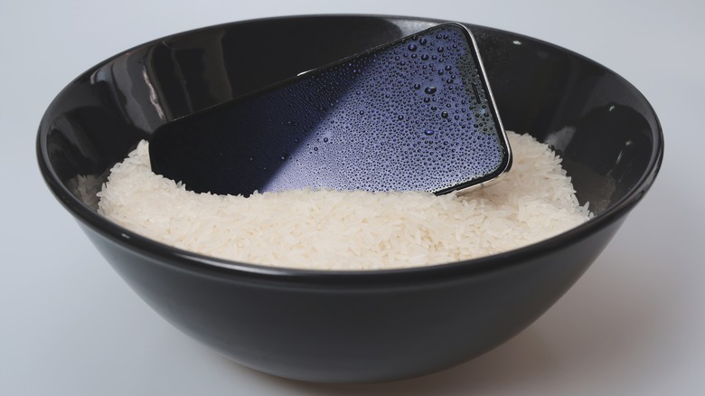 iPhone drying in rice