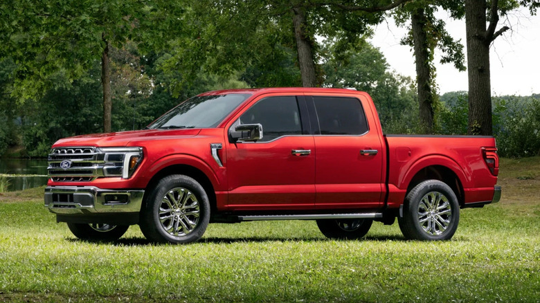 Ford F-150 with Carhartt trim parked by a lake in the woods
