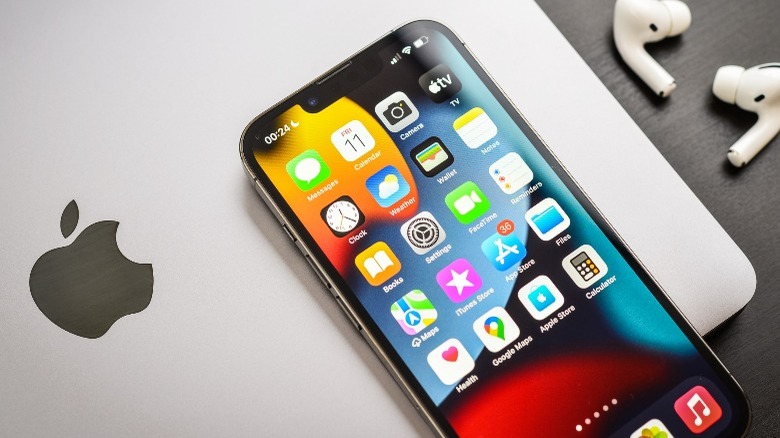 iPhone on MacBook by AirPods