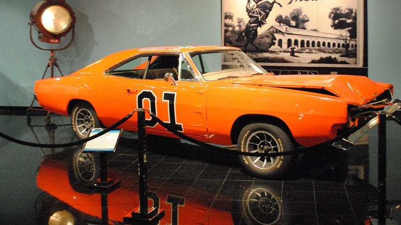 The Dukes of Hazzard General Lee Charger with nose damage on display.