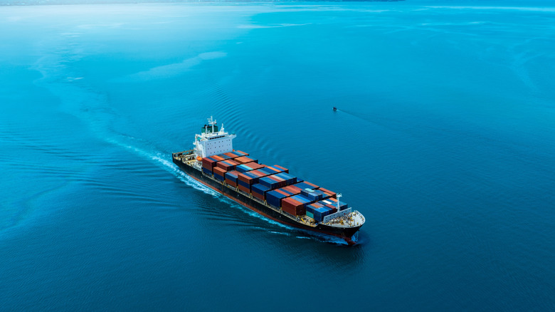 Aerial view of the freight shipping transport cargo ship container.