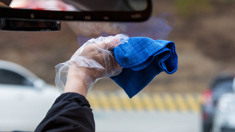 Wiping inside windshield
