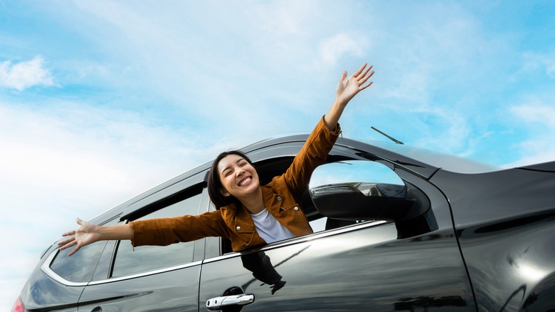 woman in new car