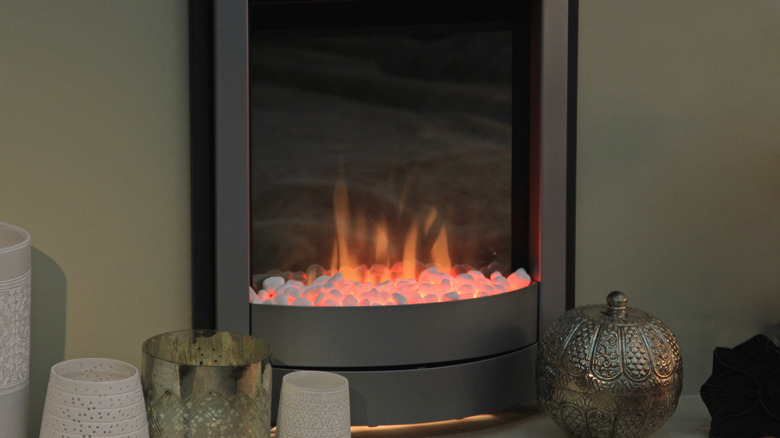 artificial fire in electric fireplace