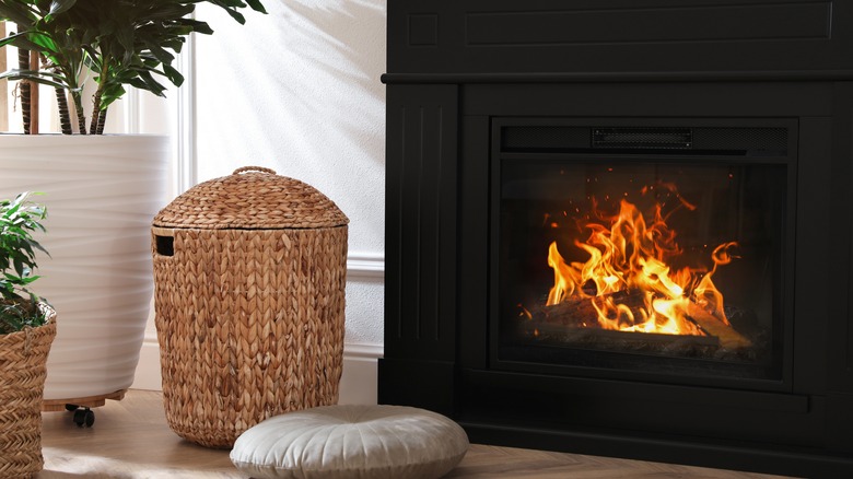 electric fireplace next to rug