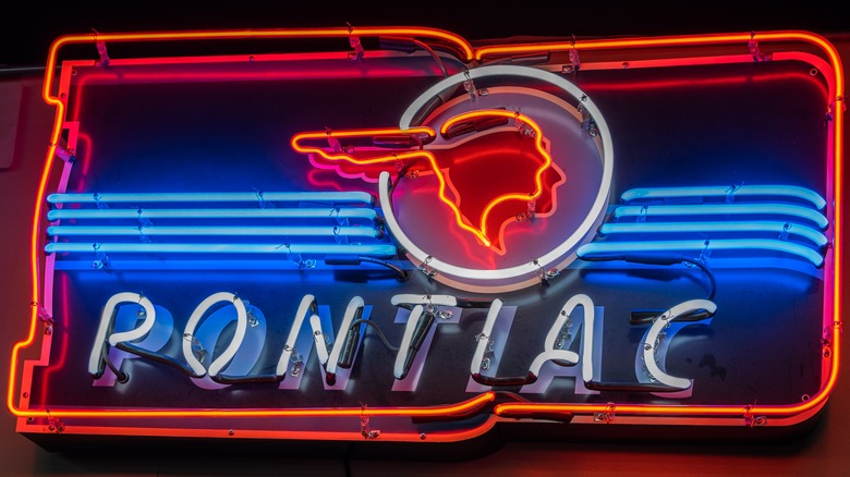 Early neon Pontiac car dealership sign