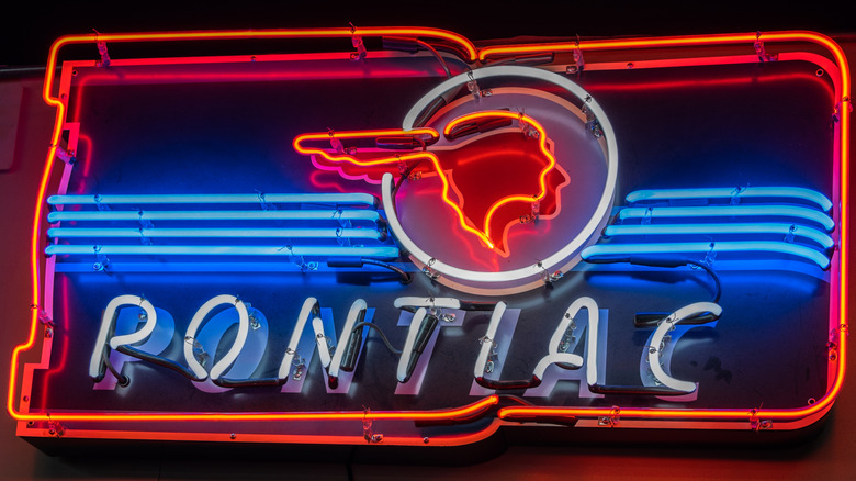 Early neon Pontiac car dealership sign
