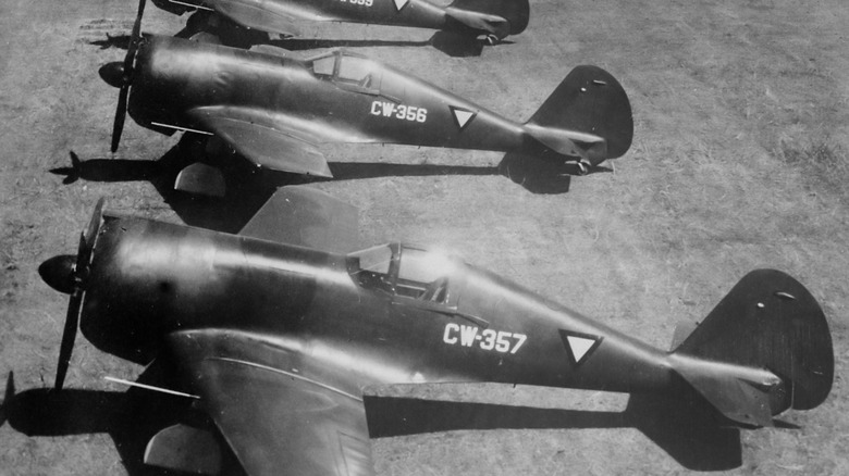 Curtiss-Wright CW-21B planes parked on the ground