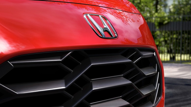 Close-up of Honda logo and front grille