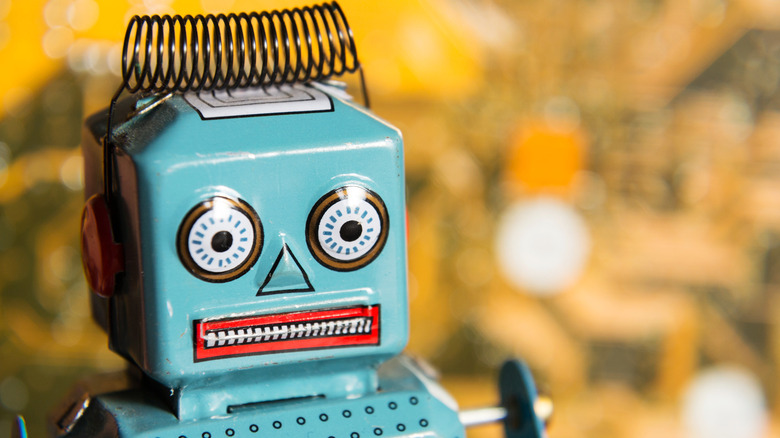 robot toy scared face spring