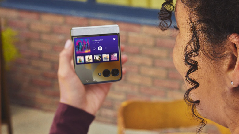Woman using the Motorola Razr 2026