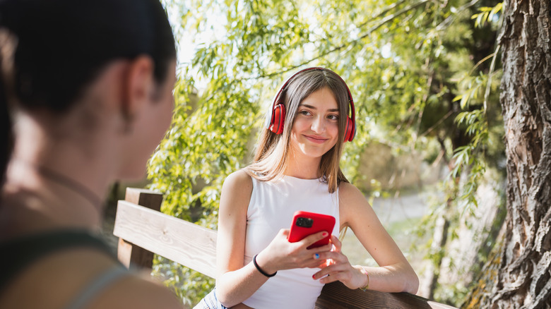 iphone girl smiling at someone