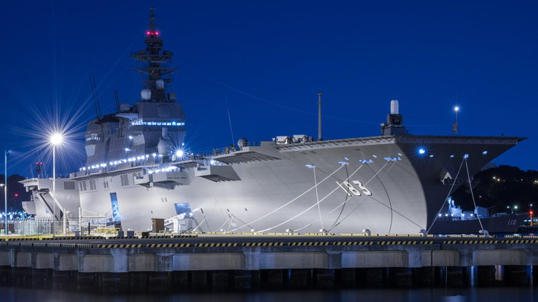The Izumo docked at night