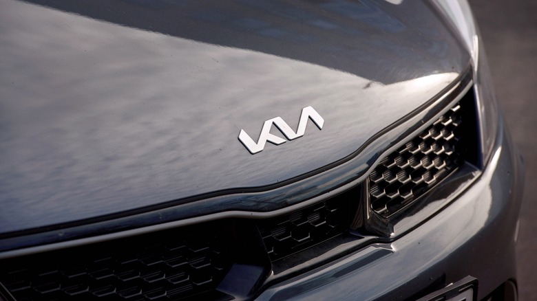 Kia hood emblem closeup