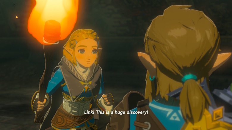 Zelda holding a torch, exclaiming "Link! This is a huge discovery!"