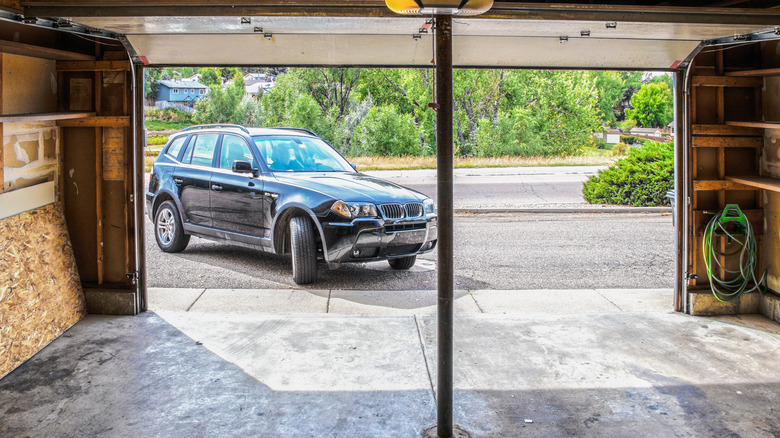 SUV driving into garage