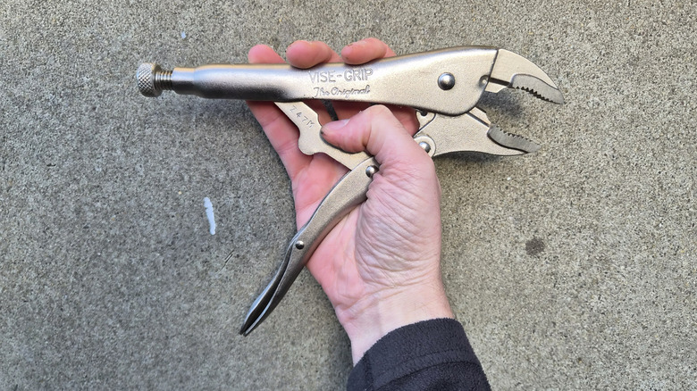 holding my mole grip pliers