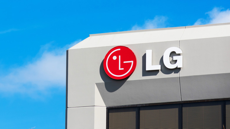 LG sign on a building against a blue sky