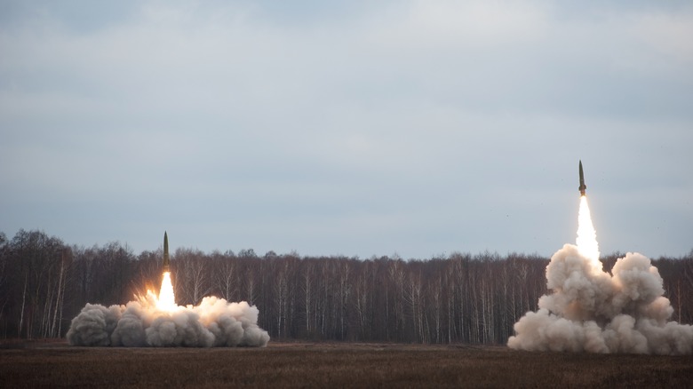 rocket-assisted artillery being fired