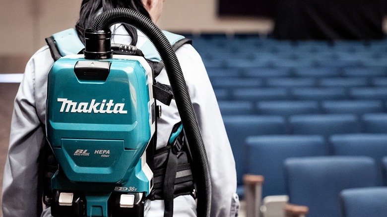 Makita backpack vacuum on person