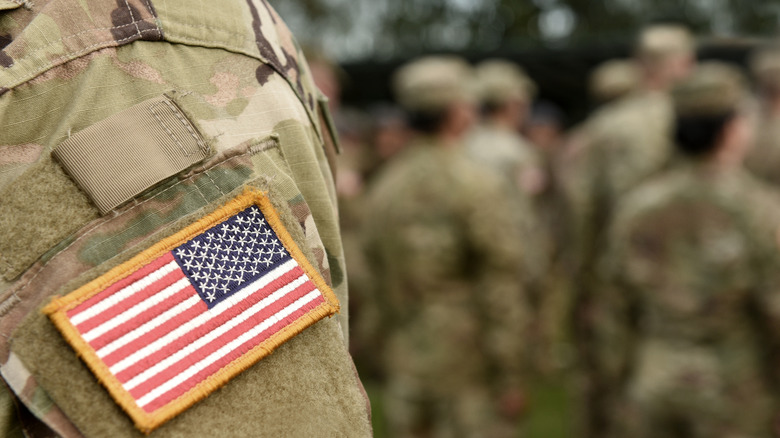 Close-up of a U.S. flag patch on an American soldier's uniform