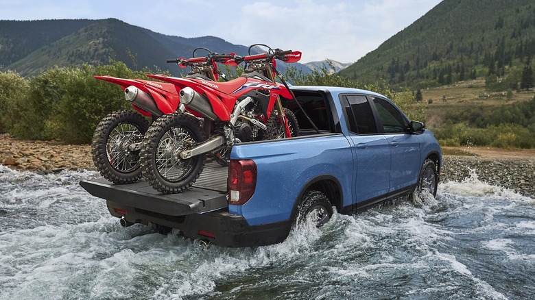 2024 Honda Ridgeline Trailsport driving through a river