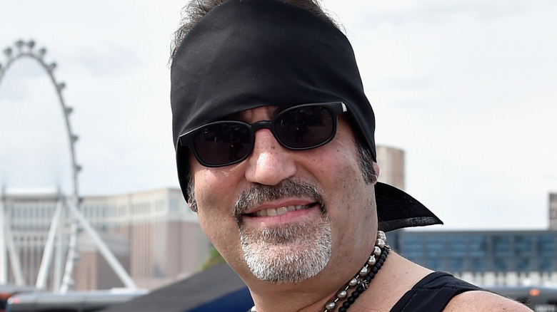 Danny Koker smiling with sunglasses