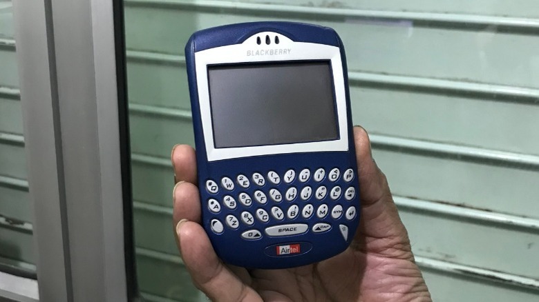 hand holding BlackBerry Quark 6230