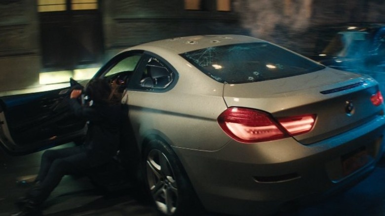 A 2012 BMW 6 during an intense action scene in "Ballerina"