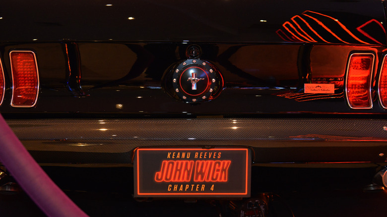 John Wick driving a 1971 Plymouth 'Cuda in Paris in 