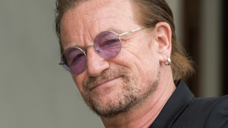 Bono with purple sunglasses