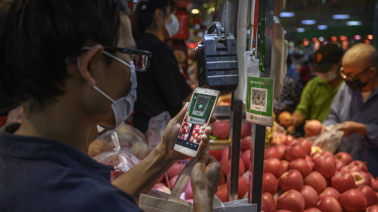 customer using mobile payments