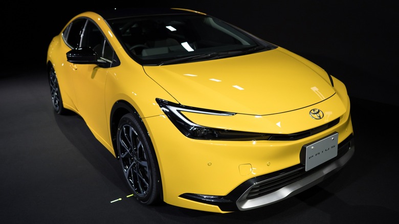 yellow Toyota Prius